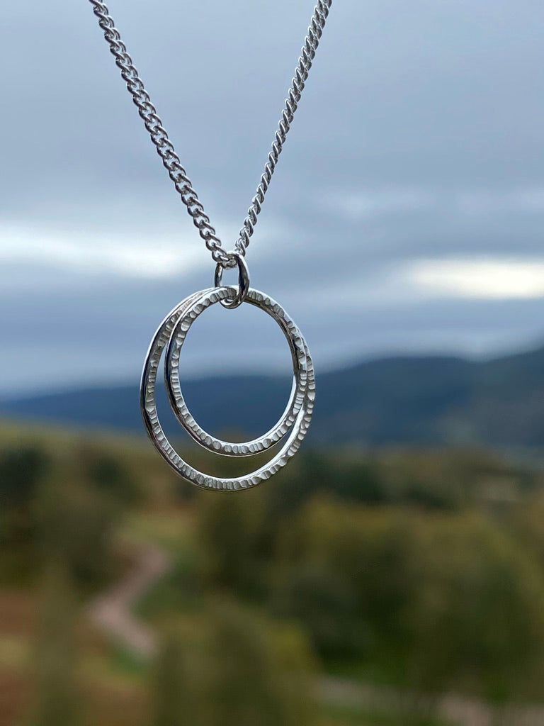 Sterling Silver Infinite Necklace with Hammered Circles